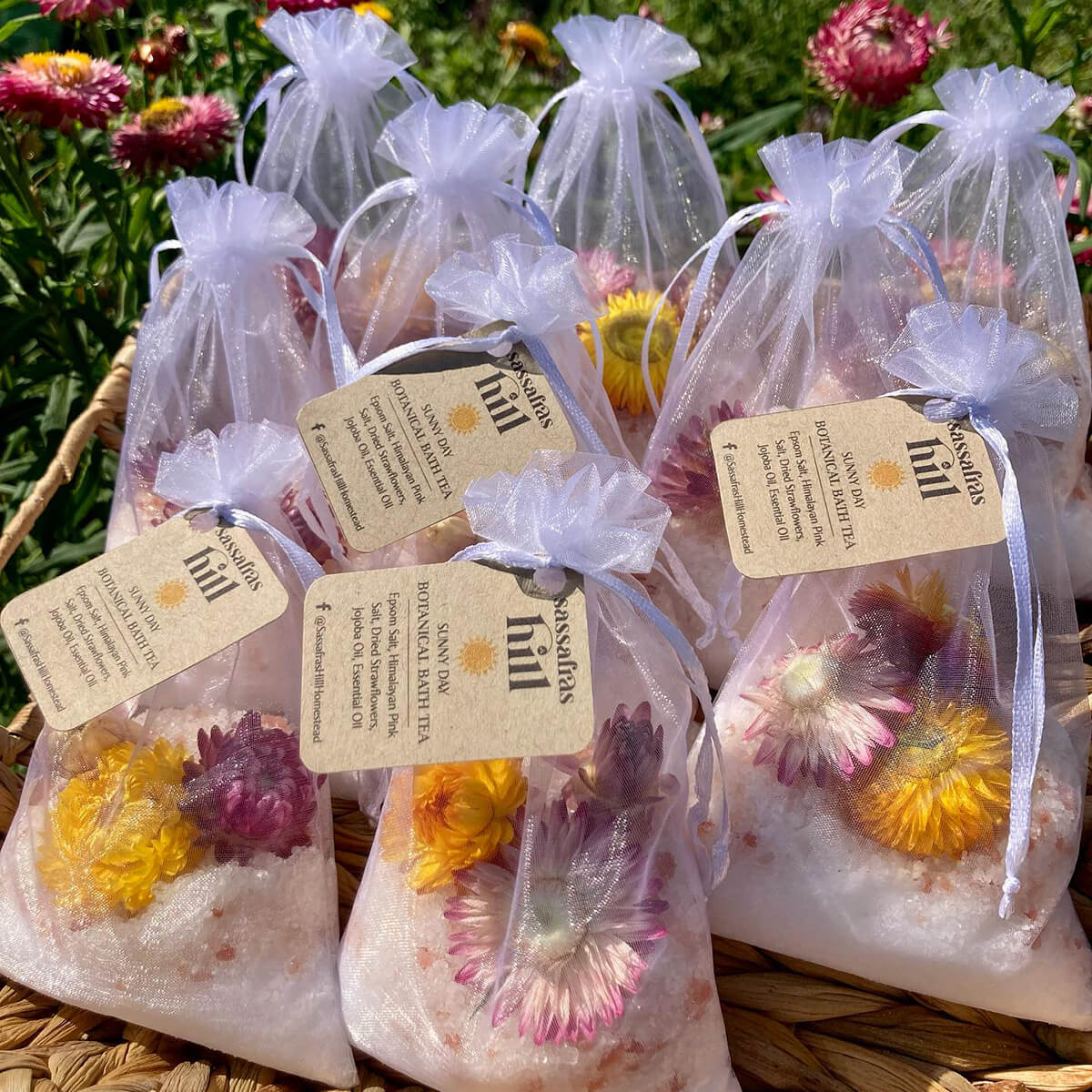 Botanicals, nourishing oils and minerals in a bath soak sachet made by Sassafras Hill.